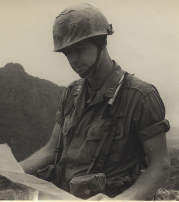 1967 Vietnam photo of then Captain John Ripley studying a map with his trademark smile. 