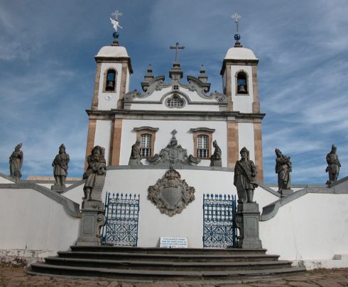 twelve Prophets sculpted by Aleijadinho in front of the church of the sanctuary of Bom Jesus of Matosinhos at Congonhas, Minas Gerais, Brazil ; Isaiah is the first statue on the left on the pillar at the beginning of the steps.