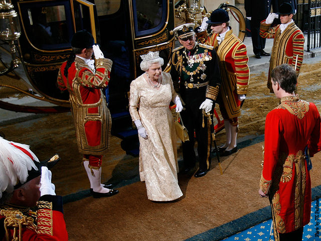Queen Elizabeth II arrives at the House of Parliament to formally open a new parliamentary session, as part of the State Opening of Parliament. 