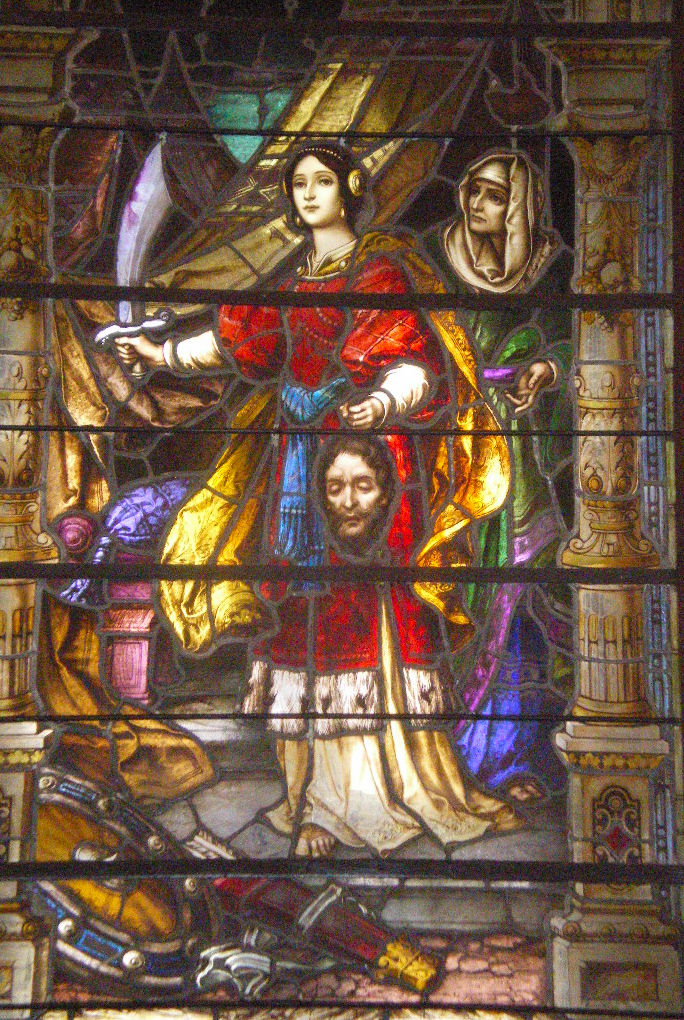 Judith with the Head of Holofernes. One of the Stained glass windows inside the Church.