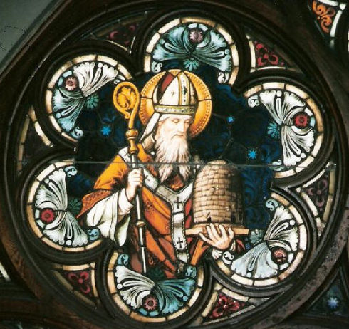 When St. Ambrose was an infant, a swarm of bees settled on his face while he lay in his cradle, leaving behind a drop of honey. His father considered this a sign of his future eloquence and honeyed tongue. For this reason, St. Ambrose is the patron Saint of Beekeepers.