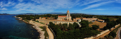 Church and monastery of the Lérins Abbey, on the island of Saint-Honorat, one of the Lérins Islands, close to Cannes, France. Photo by Afernand74