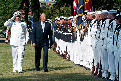 US Navy (USN) Commander (CMDR) Scott Chapman (left), Commanding Officer (CO), US Navy Ceremonial Guard, Naval District Washington (NDW), Washington DC, escorts his Majesty King Harald V (right), the King of Norway, during a Full Honor Ceremony (FHC) on his behalf of his official visit to the United States celebrating 100 years of diplomatic relations between Norway and the United States and to deliver relief supplies to assist in the Hurricane Katrina recovery efforts.