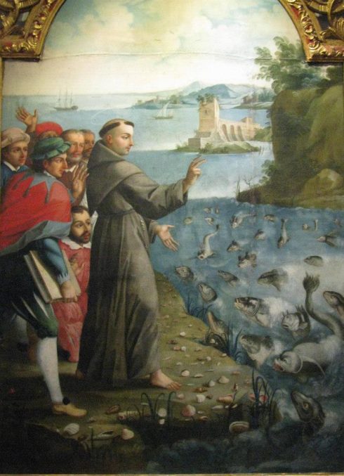 St. Anthony preaching to the fish. Men would not listen to him so he preached to the fish. As a result the town did indeed listen to him. Painting at the Convent of St. Francis, Quito, Ecuador.
