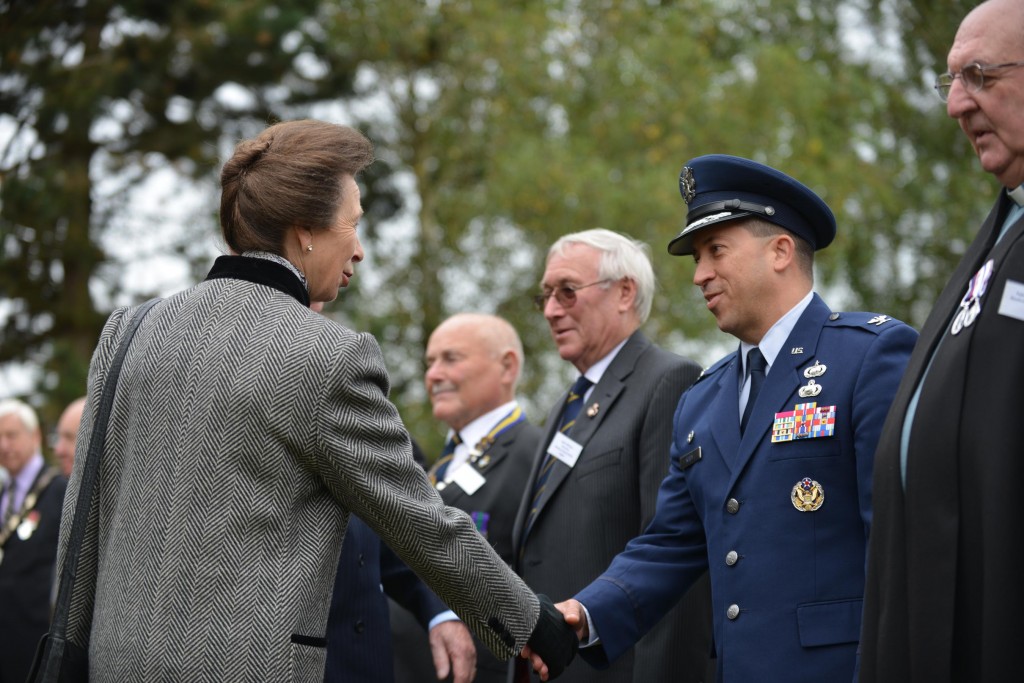 Col. Brian Kelly, 501st Combat Support Wing commander, greets Her Royal Highness, Princess Anne, The Princess Royal before she dedicates three memorial stones for U.S. Visiting Forces at the Greenham Business Park in Greenham Common, U.K., Sept. 21, 2012.