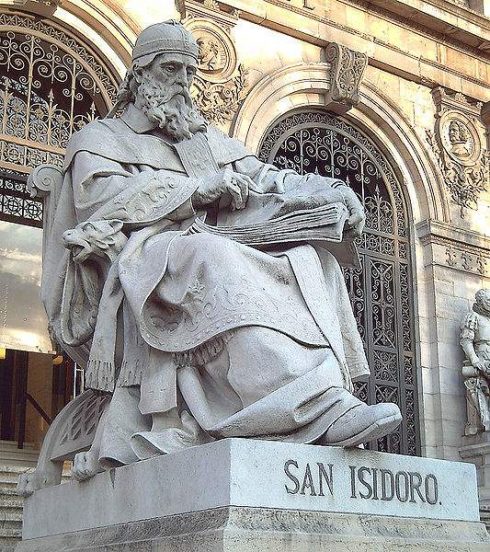 Statue of St. Isidore of Seville at the entrance staircase of the National Library of Spain, in Madrid. Photo by Luis García.