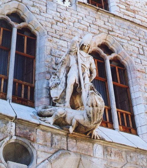 Statue of St. George in Léon, Spain, which is over the entrance to a bank, a former castle.