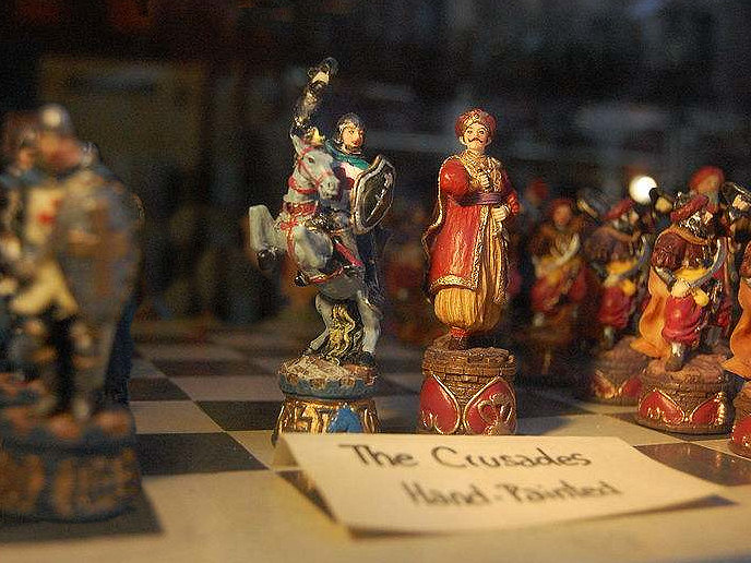 A Crusaders v Infidel Chess set displayed in a window in New York. Photo by Daniel Lightfoot