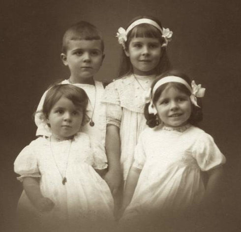 Left front is Marie-Antoinette and next to her is Magdeleine. Back is Jacques and Anne, who is eight years old.