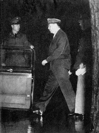 General Douglas MacArthur entering his 1950 Chrysler Crown Imperial Limousine in April 1951.