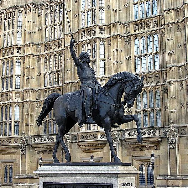 A bronze sculpture of Richard the Lionheart, outside the Houses of Parliament in London, England.